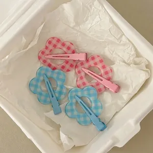 Sweet floral hair clips with pink and blue gingham patterns for women and girls