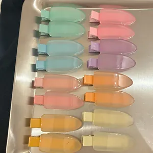14-piece set of matte macaron colored hair clips displayed on a metal tray