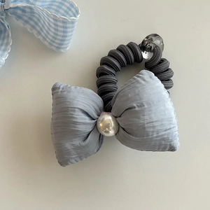 Elegant grey bow telephone wire hair tie with a pearl accent and crystal bead