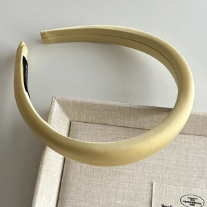 Elegant thick yellow sponge headband in premium satin finish for women hair styling