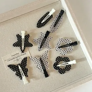 Polka dot hair clips set in floral and butterfly shapes with high-quality resin finish