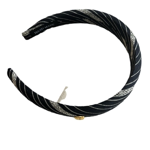 Handmade black striped square fabric headband with jacquard pattern and gold buckle detail