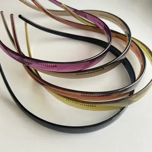Nonslip hairbands set with teeth in various colors like black, purple and brown