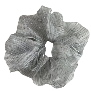 Silver-grey pleated chiffon scrunchie with sparkling sequins and vertical stripe texture