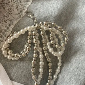 Elegant pearl and silver bead fringe charm with metal lobster clasp for bags and shoes