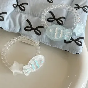 Spiral-Haargummis im Jelly-Stil mit Glitzerfisch und Stern-Anhängern, 2er-Set