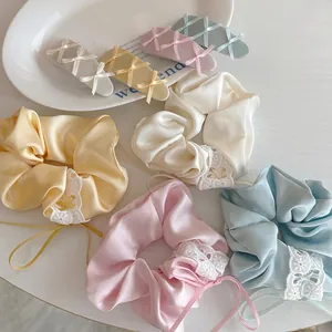 Elegant ballet-style satin ribbon hair scrunchies and bow hair clips set for women