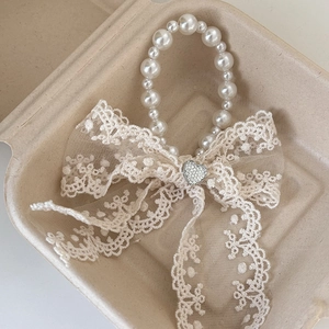 Fermaglio per capelli con fiocco di pizzo bianco, anello di perle e fibbia a cuore