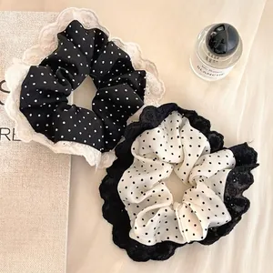 Elegant polka dot lace scrunchies in black and white styles with French retro design