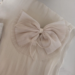 Elegant cream pleated bow hair clip with long ribbons and delicate mesh textures