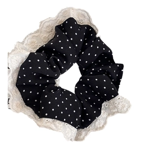 Retro black polka dot scrunchie with floral lace trim and embroidery detail