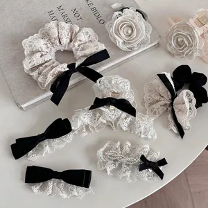 Elegant white lace hair accessories set with floral details and vintage style hair ties