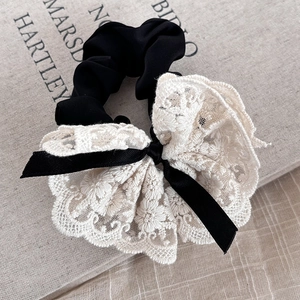 Vintage double-layer lace scrunchie with black bowknot and white embroidery detail