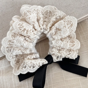 Lace floral scrunchie hair tie with black satin bow in elegant cream white color