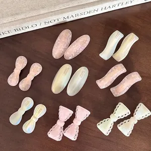 Pink marbled acetate hair clip set with France Handmade text on elegant wood background