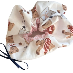 Cute teddy bear scrunchie with pink checkered lining and a blue ribbon bow decoration