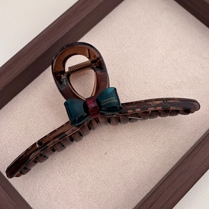 Elegant translucent brown resin claw clip with vintage dark green and burgundy bow