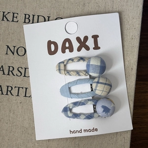 Three-piece set of blue plaid chiffon heart hair clips on a handmade display card