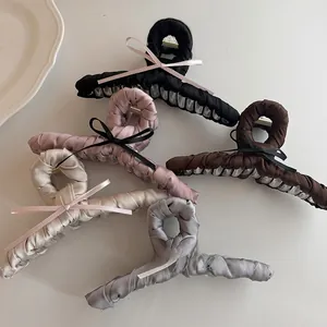 Set of five elegant satin ribbon bow hair claws in black, pink, brown, champagne, and grey
