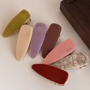 Handmade acetate hair clip set in vintage candy colors with a French minimalist design style