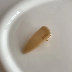 Elegant triangular cream-colored acetate hair clip with France Handmade gold lettering