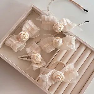 Elegant cream white rose hair accessories set including satin headband and lace floral clips