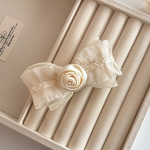 French style cream white rose lace bow hair clip elegantly placed in a velvet gift box
