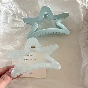 Starfish hair claw clips set in creamy sky blue and marble white acrylic material