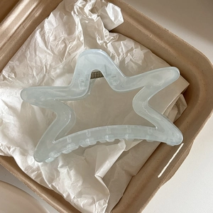 Star-shaped creamy blue acrylic claw clip with a translucent jelly finish for hair styling