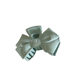 Pastel blue jellyfish starfish hair claw clip with bow design in acrylic finish