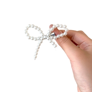 Fermaglio per capelli con fiocco di perle fatto a mano dal design elegante e stile francese