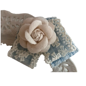 French vintage camellia hair clip with cream fabric flower and white lace trim