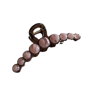 Brown acrylic hair claw clip with pearlescent marble beads for women elegant hair styling