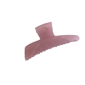 Pink translucent acrylic hair claw clip with matte finish and metallic spring