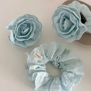 Lace flower hair clips and light blue scrunchie set with handmade embroidery details