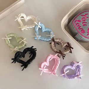 Eleganti mollette per capelli a forma di cuore con nastri di raso e fiocchi in sette colori