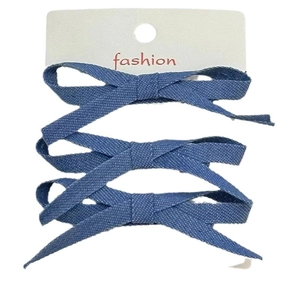 Three-piece denim blue bow hair clip set with elegant long ribbons on white card