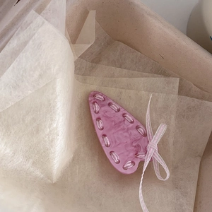 Pink marble acetate hair clip with ribbon bow tie, elegant accessory for women
