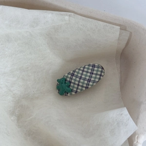 Cute purple and green plaid hair clip with a 3D green bear charm for girl's styling