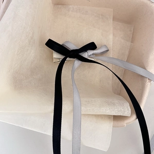 Elegant double-layered satin ribbon bow hair clip with long streamers in black and grey