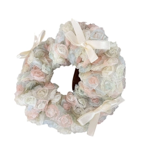 Colorful floral mesh hair scrunchie with lace flowers and satin bows on white background