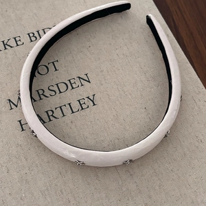 White faux leather star headband with silver metallic accents for women's hair styling