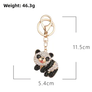 Sparkling panda keychain with rhinestones and gold lobster clasp, size 11.5cm by 5.4cm