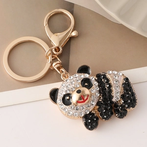 Golden panda keychain with sparkling black and white crystals and lobster clasp