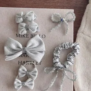 Elegante 6-delige zilveren glitter haarstrikken en elastiekjes set voor meisjes