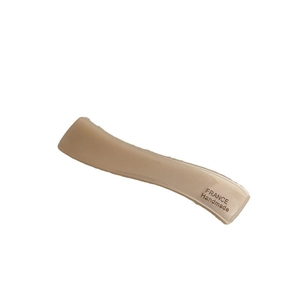 Barrette à cheveux minimaliste en acétate beige avec design incurvé et lettrage doré