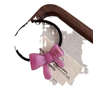 Purple acetic acid bow hair tie with high elastic brown rubber band and gold lettering