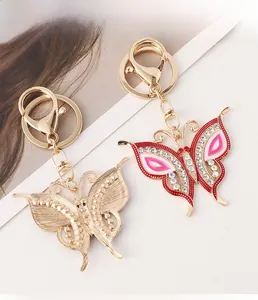Detail of colorful enamel butterfly keychain with crystal rhinestones and gold alloy clasp