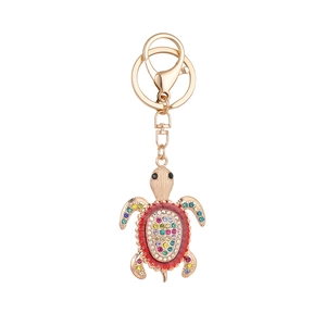 Porte-clés tortue de mer orné de cristaux colorés et strass avec fermoir doré brillant