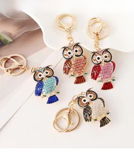 Detailed set of owl keychains with sparkling rhinestones and colorful enamel on gold alloy